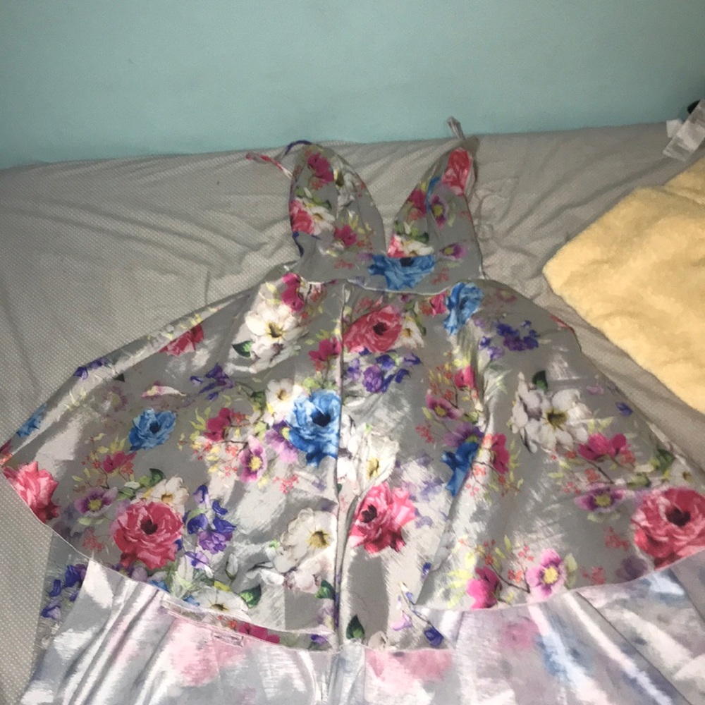 Dress with a short front and a layered ta